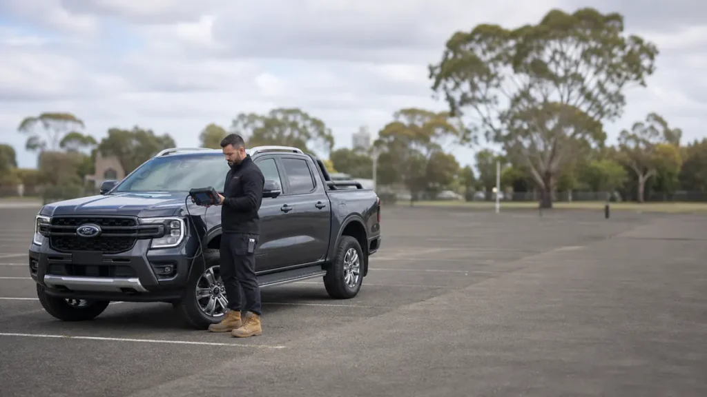 Auto locksmith programming a Ford Ranger key with a diagnostic tool
